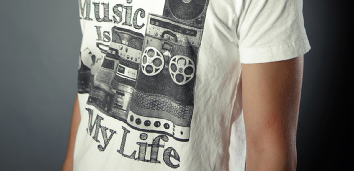 Jony C wears a shirt that says 'Music is my life'