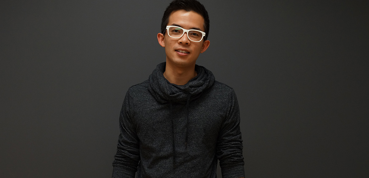 Jony C in white glasses